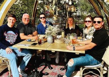 Debby Mount with her family having brunch.